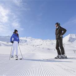 Skier on ski slope infront of the Wurmkogl Mountain